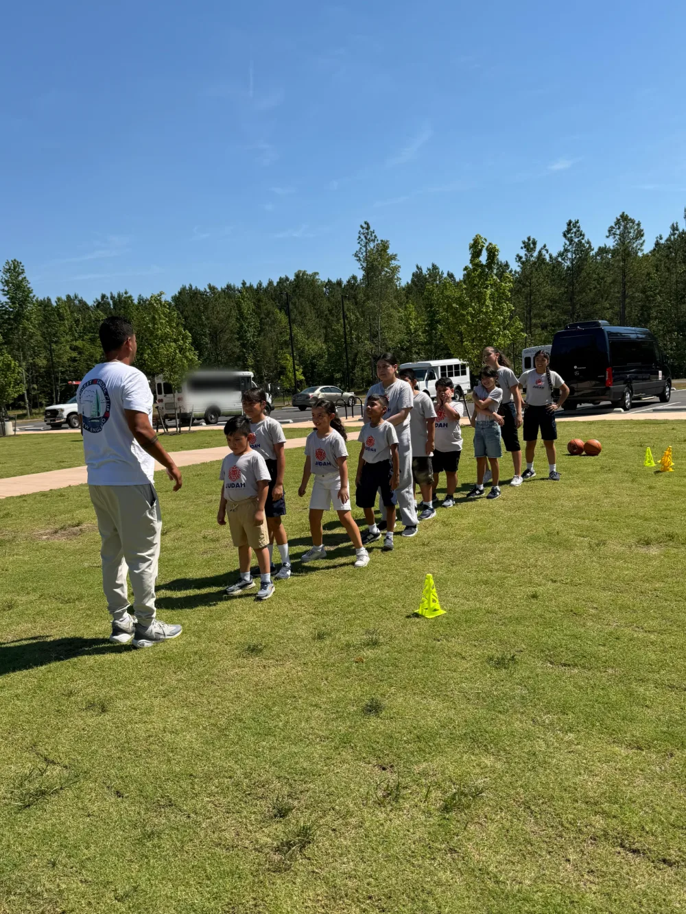 A group of students outdoors during an activity day.